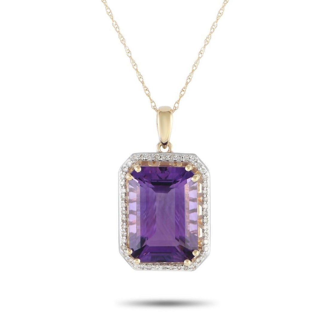 14K YELLOW GOLD 0.20CT DIAMOND AND AMETHYST PENDANT NECKLACE: A bold Amethyst gemstone serves as a stunning focal point on this elegant necklace. Crafted from 14K yellow gold, this pieces pendant measures 1.0 long by 0.50 wide and is suspended from a delicate