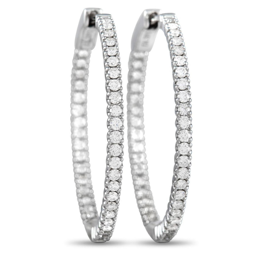 14K WHITE GOLD 0.98 CT DIAMOND INSIDE-OUT HOOP EARRINGS: Sleek and stylish, these 14K White Gold hoop earrings will never go out of style. The minimalist design allows their 0.98 carats of sparkling inset diamonds to take center stage. Each one measures 1.1