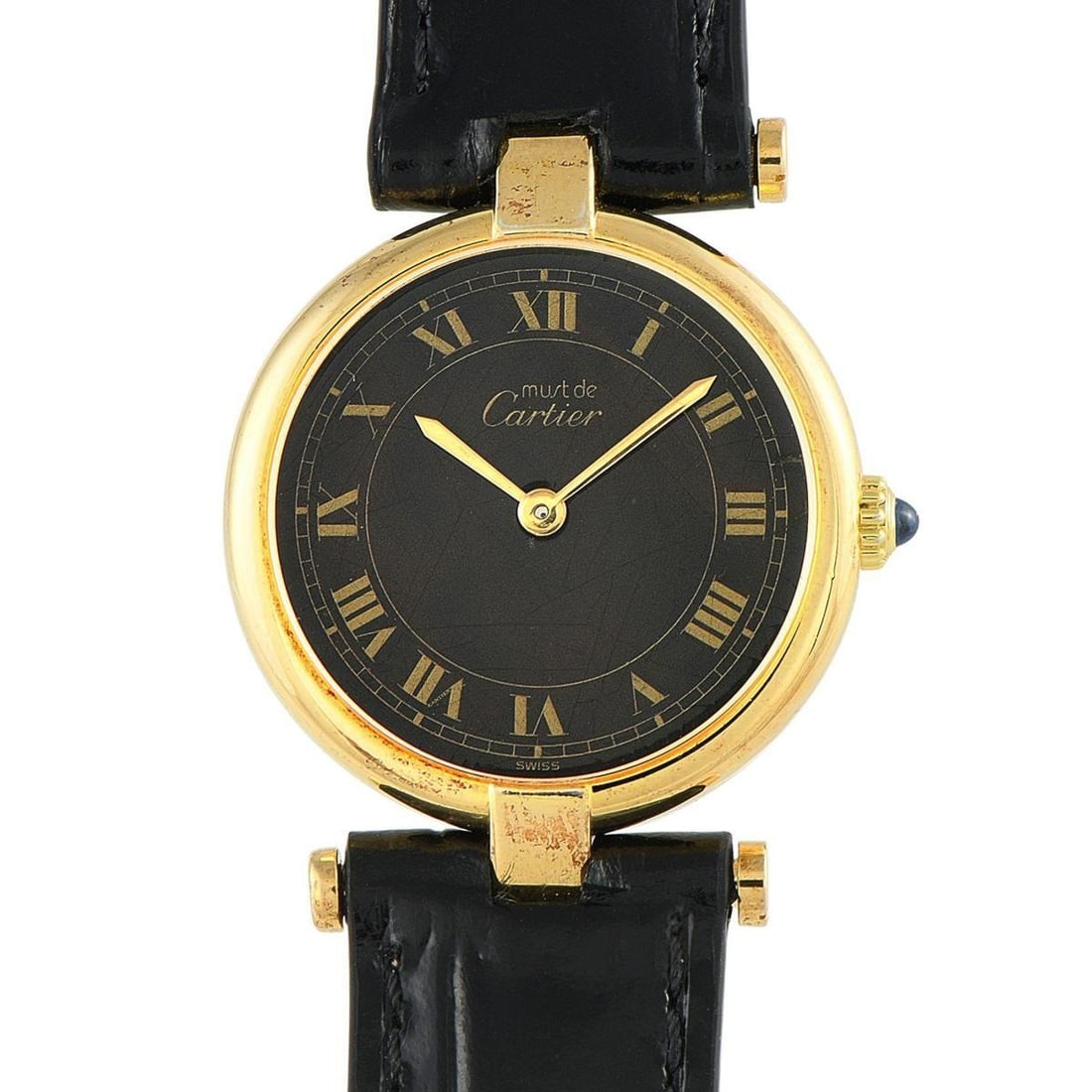 CARTIER MUST DE CARTIER VENDME DARK CHOCOLATE ROMAN DIAL VERMEIL QUARTZ WATCH: Discontinued, but still turning heads. This round Must de Cartier Vendome features a dark chocolate brown dial with a Roman numeral hour chapter ring framed by the brand's signature railroad-style min