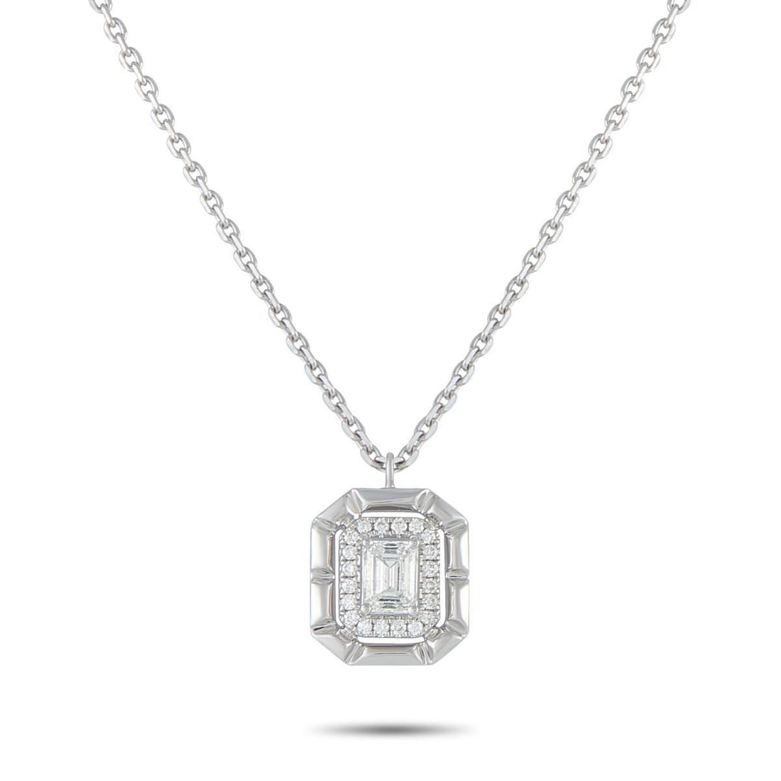 18K WHITE GOLD 0.62CT DIAMOND PENDANT NECKLACE: A 0.50 carat Diamond makes a statement at the center of this exquisite necklace. Set in 18K White Gold, additional Diamond accents totaling 0.12 carats surround the center stone for additional sparkle
