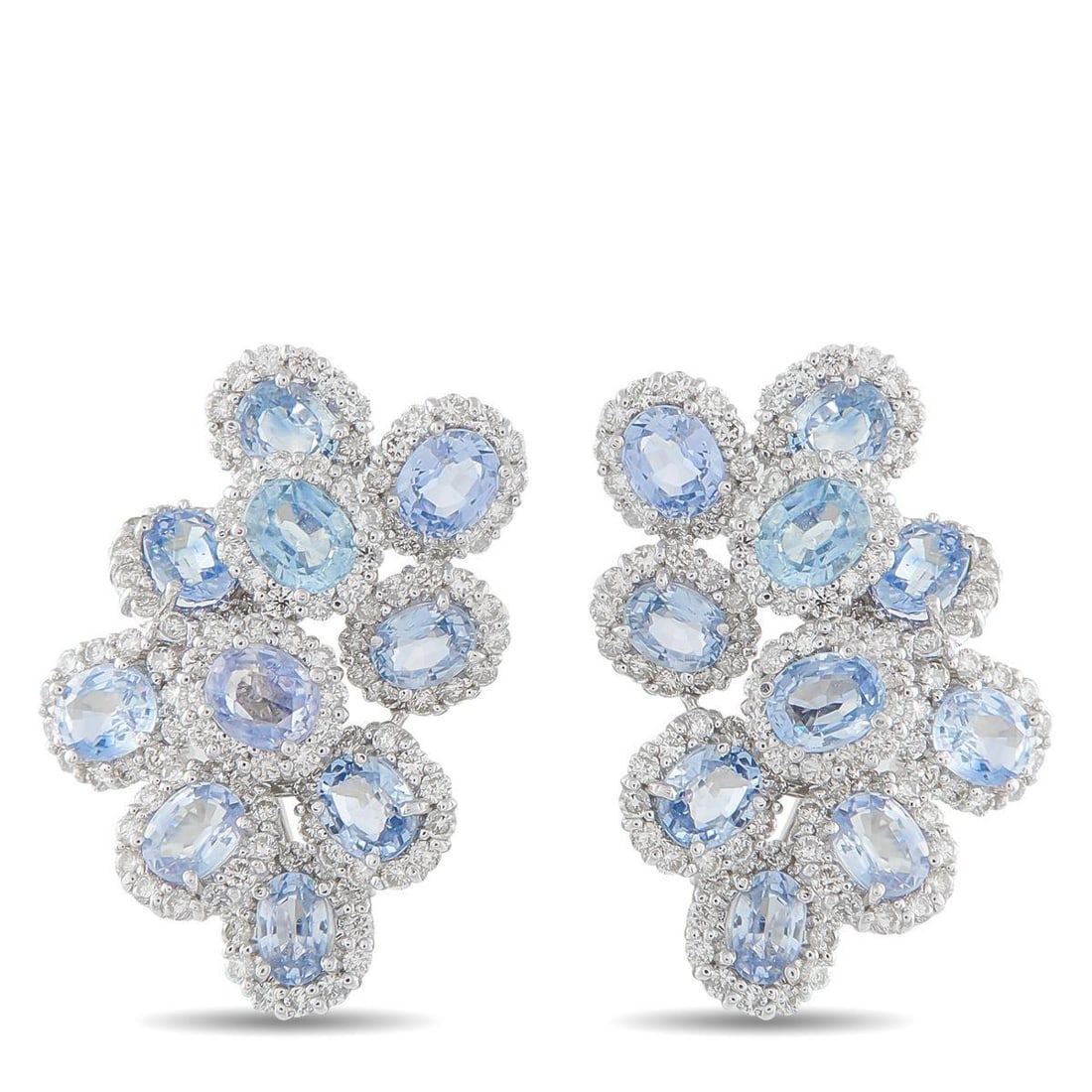 18K WHITE GOLD 3.0CT DIAMOND AND SAPPHIRE CLIP-ON EARRINGS: These luxury earrings will add a stylish pop of color to any ensemble. Elevated enough for even your most special occasions, Sapphires totaling 10.0 carats make them instantly eye-catching. Diamond ac