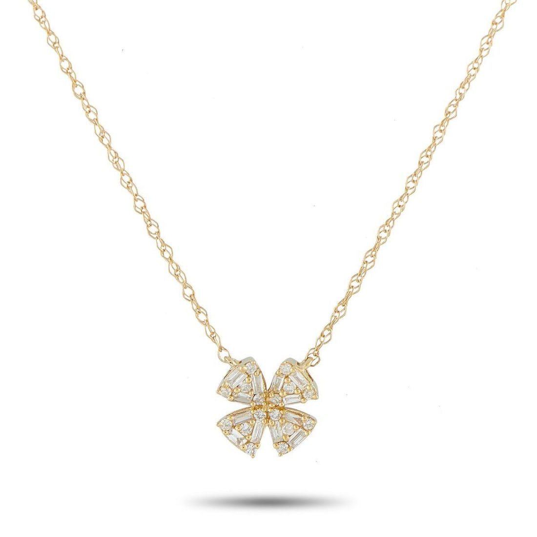 14K YELLOW GOLD 0.20CT DIAMOND PENDANT NECKLACE: This 14K Yellow Gold necklace is stylish, charming, and perfectly understated. At the center of a delicate 18 chain, youll find a clover-shaped pendant measuring 0.32 round. Sparkling Diamonds totalin