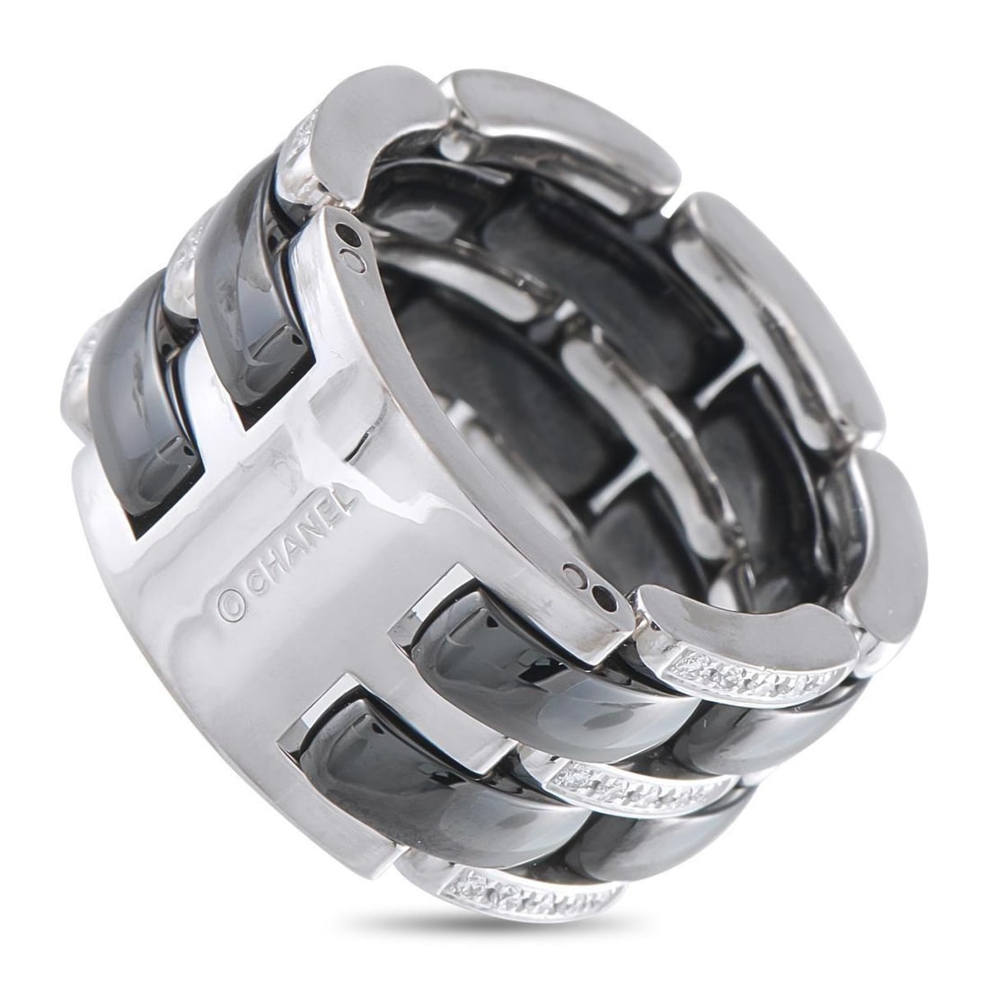 CHANEL ULTRA 18K WHITE GOLD 0.38CT DIAMOND AND BLACK CERAMIC RING: A graphic, high-contrast design makes this Chanel ULTRA ring a dynamic addition to any ensemble. Black ceramic links and 18K White Gold links combine to create the bold, breathtaking design. Diamond a