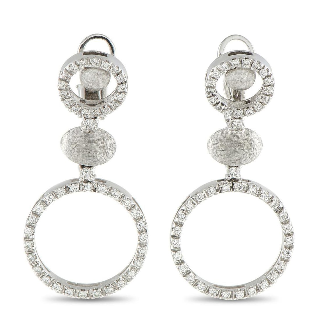 NANIS 18K WHITE GOLD 1.20CT DIAMOND EARRINGS: These Nanis earrings are designed to add sparkle to every movement. Diamonds with a total weight of 1.20 carats elevate the circular 18K White Gold settings. Each earring measures 1.50 long by 0.69 wi