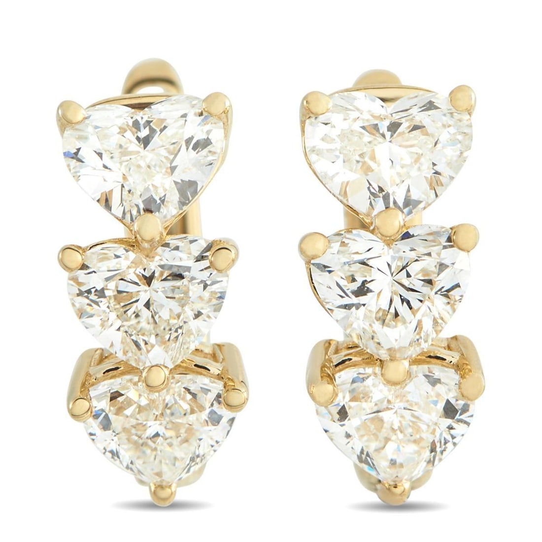 18K YELLOW GOLD 3.0CT DIAMOND EARRINGS: Heart-shaped Diamonds with a total weight of 3.0 carats make these luxury earrings simply unforgettable. Perfect for any true romantic, each earring features an 18K Yellow Gold setting and measures 0.