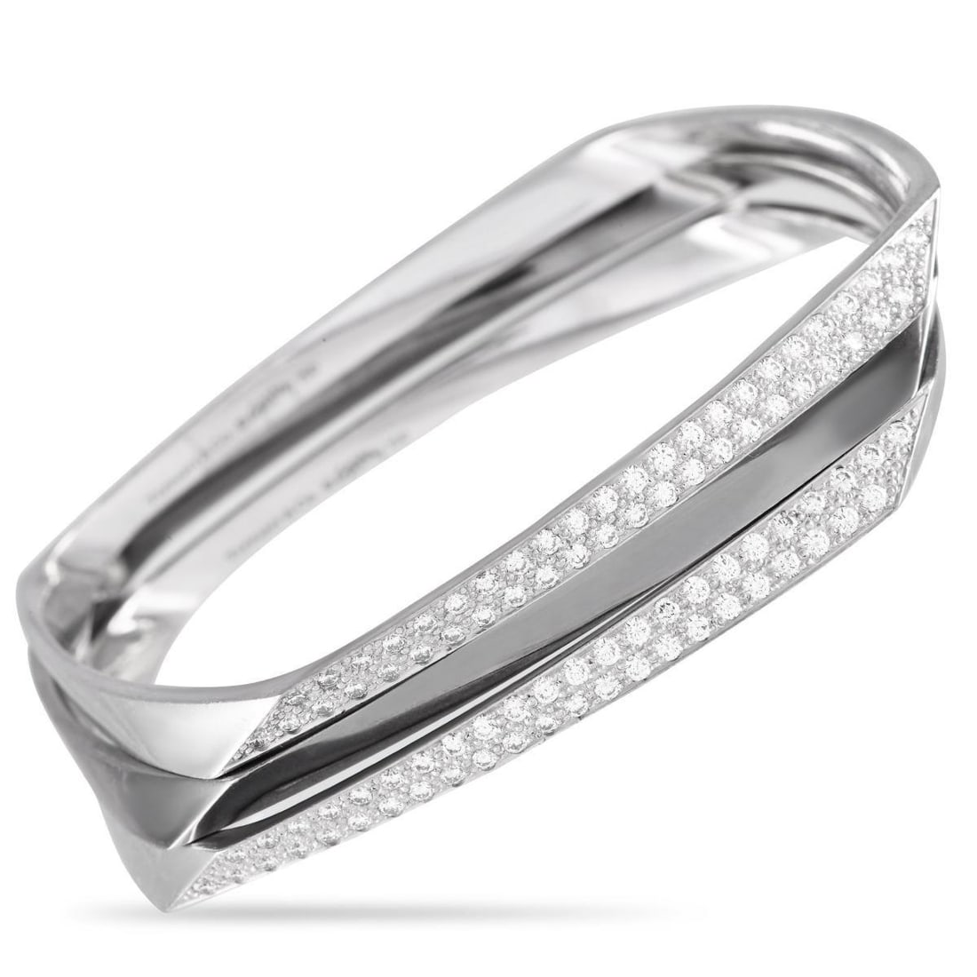 TIFFANY & CO. GEHRY 18K WHITE GOLD 1.20CT DIAMOND BRACELET SET: This Tiffany & Co. Gehry Bracelet Set features a trio of uniquely elegant 18K White Gold bangle bracelets. Meant to be worn together as a stacked set, each piece features clean lines and a distinctly 