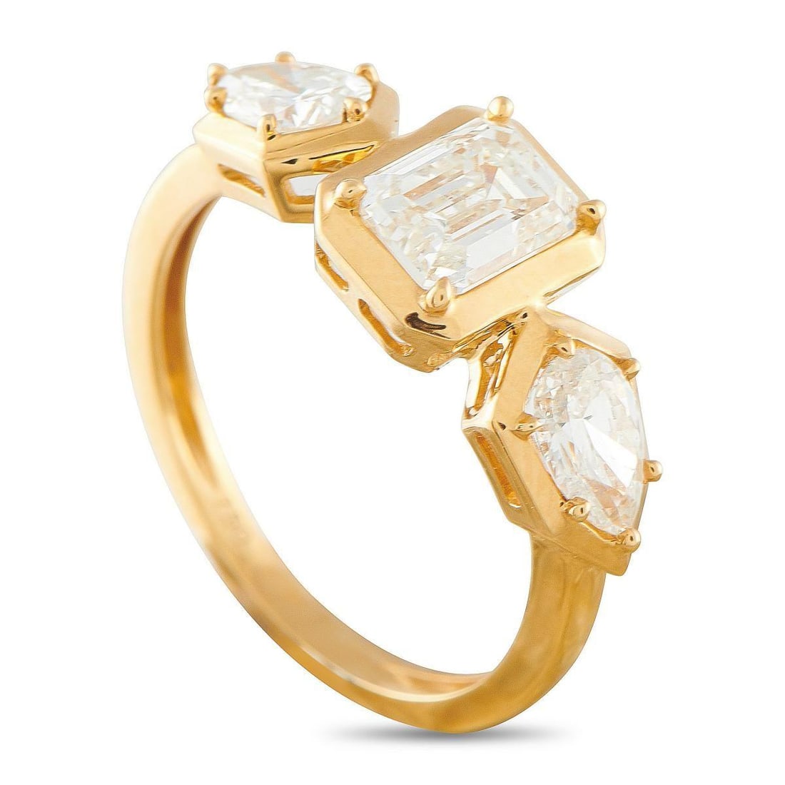 18K YELLOW GOLD 1.76CT DIAMOND RING: A classically elegant design ensures that this luxury ring will never go out of style. At the center, a 1.01 carat Diamond effortlessly catches the light. Pear-shaped Diamonds with a total weight of 0