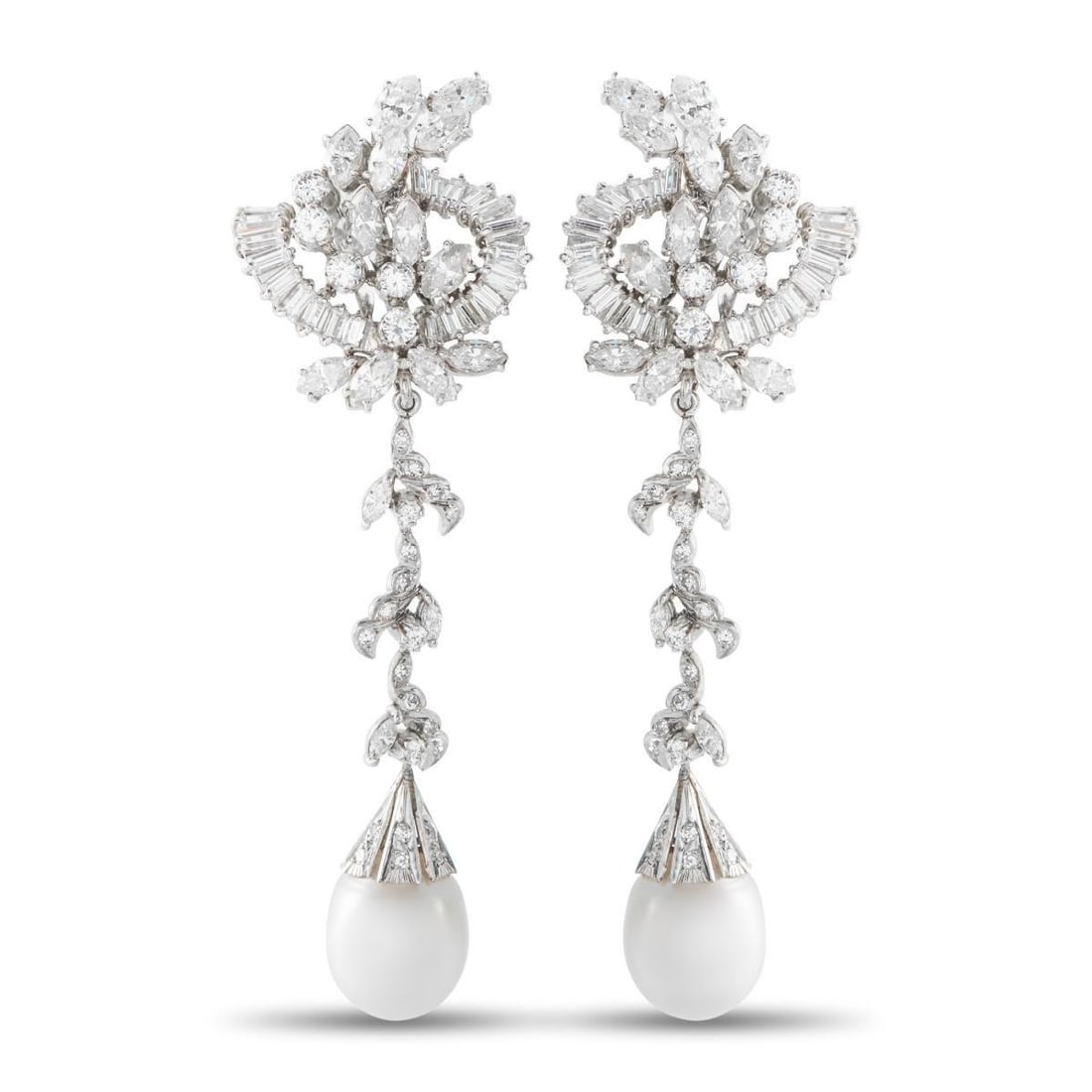 PLATINUM 7.0CT DIAMOND AND PEARL EARRINGS: Pearls measuring 12.2mm dangle delicately on these radiant earrings. Set in Platinum, Diamonds with a total weight of 7.0 carats make them impressive enough for even your most special occasions. Each 