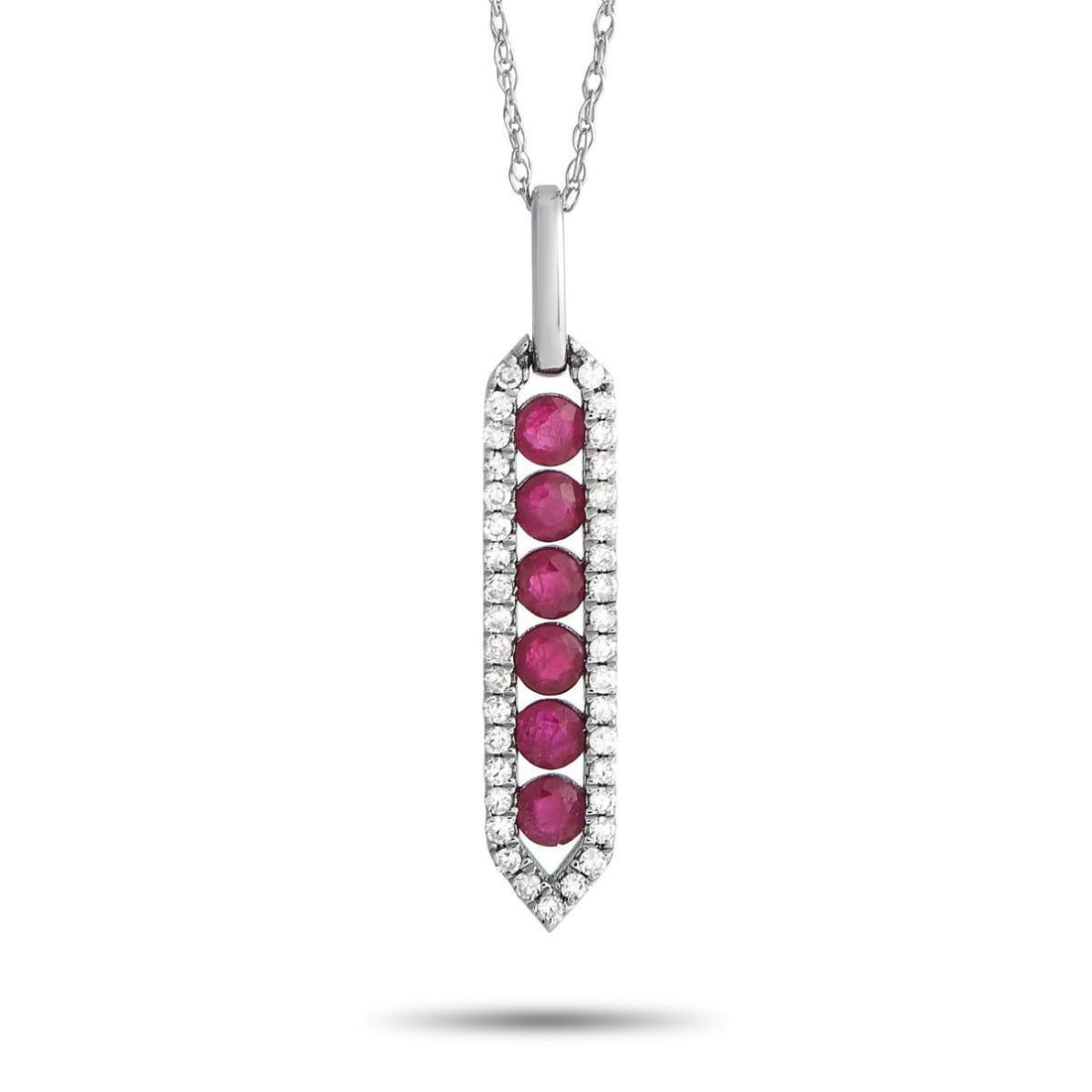 14K WHITE GOLD 0.16CT DIAMOND AND RUBY PENDANT NECKLACE: Put on this diamond and ruby necklace and let your look sparkle with a statement. This 14K white gold piece has a 17 long cable chain with a spring ring clasp. A chic pendant with six faceted rubies s