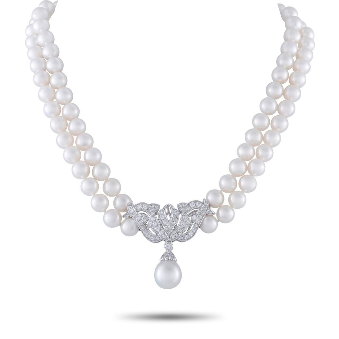 MIKIMOTO PLATINUM 2.25CT DIAMOND AND PEARL DOUBLE STRAND NECKLACE: This timeless Mikimoto necklace will continually take your breath away. An intricate Platinum pendant comes to life thanks to sparkling Diamonds totaling 2.25 carats, while a dangling Pearl provides t