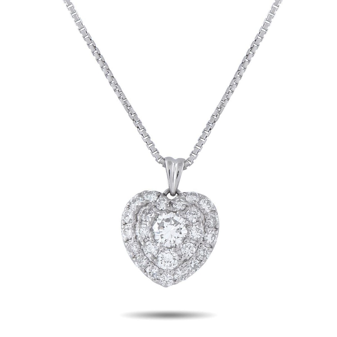 PLATINUM 1.12CT DIAMOND PENDANT NECKLACE: This luxury necklace is a timeless piece that will continually catch the light. The heart-shaped pendant comes to life thanks to a dazzling 0.41 carat Diamond center stone and additional Diamonds tota