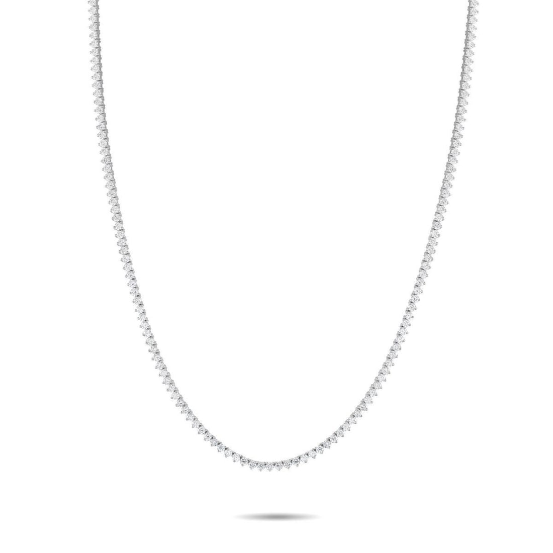 14K WHITE GOLD 7.25CT LAB-GROWN DIAMOND TENNIS NECKLACE: A series of sparkling Lab Grown Diamonds with a total weight of 7.25 carats make this tennis necklace endlessly impressive. Set in 14K White Gold, it measures 18 long and includes secure clasp closure