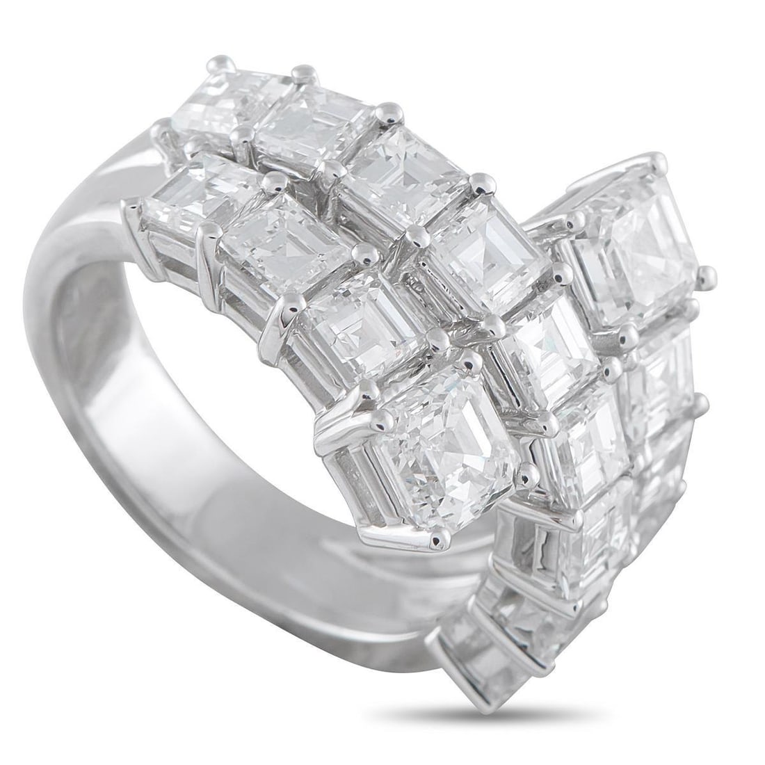 18K WHITE GOLD 4.88CT DIAMOND RING: A stunning 18K White Gold setting makes this ring look like it effortlessly wraps around the finger. Adorned with sparkling Diamonds totaling 4.88 carats, this elegant accessory will effortlessly add 