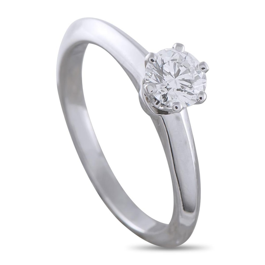 TIFFANY & CO. PLATINUM 0.38CT DIAMOND SOLITAIRE ENGAGEMENT RING: This Tiffany & Co. solitaire engagement ring is ideal for anyone who appreciates classic elegance and timeless luxury. At the center, a 0.38 carat Round Brilliant Diamond with H color and VVS1 clarity