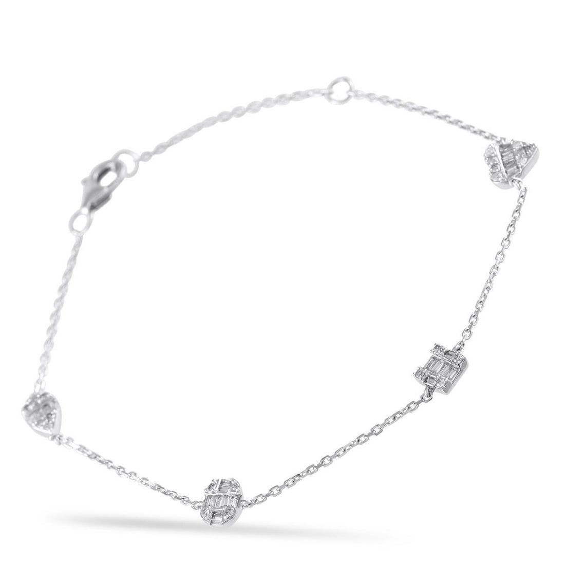 14K WHITE GOLD 0.40CT DIAMOND STATION BRACELET: Sparkling Diamond accents totaling 0.40 carats make this bracelet the perfect way to add a touch of luxury to any occasion. Simple, understated, and incredibly elegant, its crafted from 14K White Gold