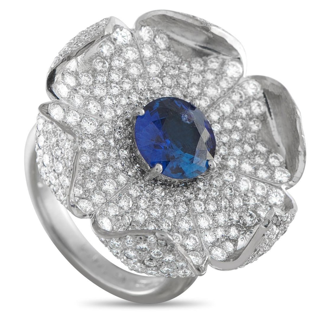 PLATINUM 2.50CT DIAMOND AND SAPPHIRE FLOWER RING: This elegant ring pairs enduring opulence with a feminine floral motif. Incredibly dramatic, an array of inset Diamonds totaling 2.50 carats are present on both sides of the curved Platinum setting. A