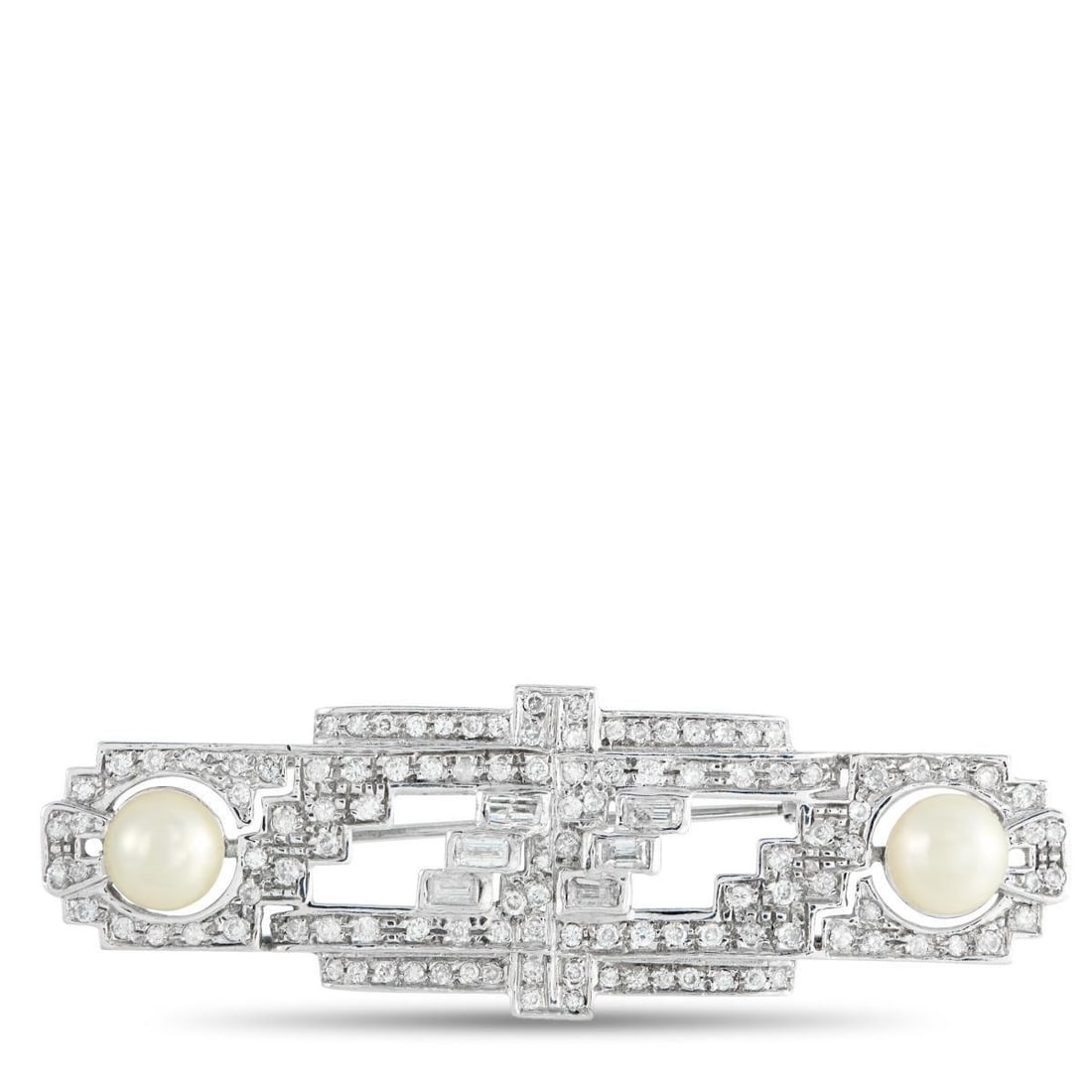 18K WHITE GOLD 2.45CT DIAMOND AND PEARL ART DECO BROOCH: Cast in frosty white gold, this Art Deco brooch delivers that vintage grandeur. Its rectangular silhouette displays stepped geometry, anchoring two cream-colored pearls at opposing poles. A mosaic of 