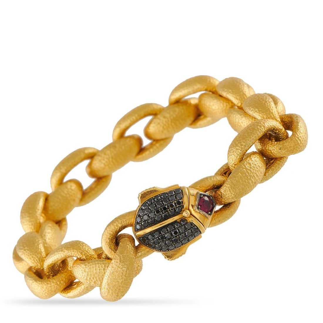 KONSTANTINO CALLAS 18K YELLOW GOLD 0.48CT BLACK DIAMOND AND RUBY BRACELET: This Konstantino Callas bracelet is incredibly opulent. The beetle shaped clasp makes a statement thanks to Black Diamonds totaling 0.45 carats and a 0.15 carat Ruby. Crafted from hammered 18K Yellow 