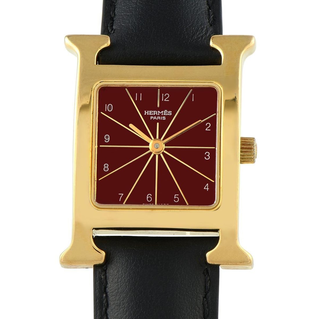 HERMES HEURE H RED DIAL GOLD PLATED STEEL QUARTZ WATCH: In this particular Herms Heure ref. HH1.201 watch, the iconic H-shaped case is paired with a vivid red dial detailed with gold-toned baton hands and fine radiating lines. Thin yet crisp Arabic numeral