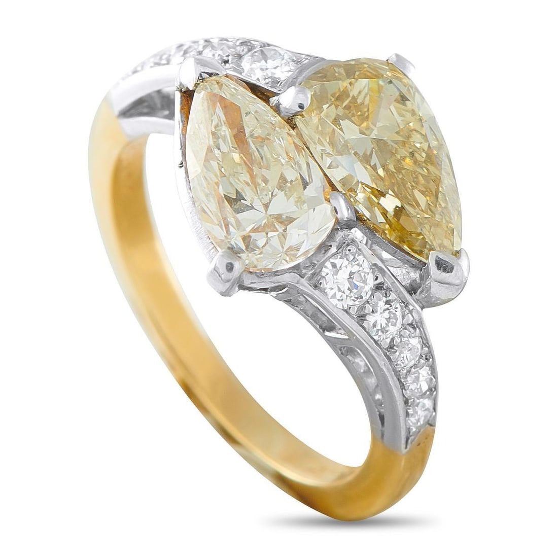 PLATINUM AND 18K YELLOW GOLD 3.29CT DIAMOND RING: Crafted from a combination of Platinum and 18K Yellow Gold, this luxurious two stone ring is beautifully balanced. White Diamonds with a total weight of 1.56 carats and yellow Diamonds with a total we