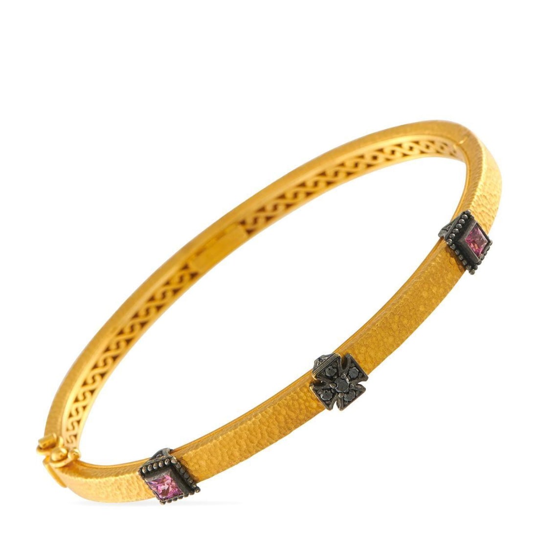 KONSTANTINO 18K YELLOW GOLD BLACK DIAMOND AND TOURMALINE BANGLE BRACELET: Crafted from hammered 18K Yellow Gold, this Konstantino bangle bracelet is incredibly opulent. The understated design is elevated by Tourmaline gemstones and Black Diamond accents. It measures 6.5 lon