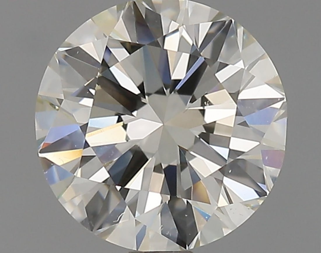 Natural 1.5 ct, Color L/VS1 GIA Graded Diamond: Lab/Natural Diamond: Natural Carat Weight: 1.5 Color Grade: L Clarity Grade: VS1 Model: Round Brilliant Fluorescence: Medium Blue Polish: Excellent Symmetry: Good Cut Grade: Very Good Size: 7.17 - 7.2