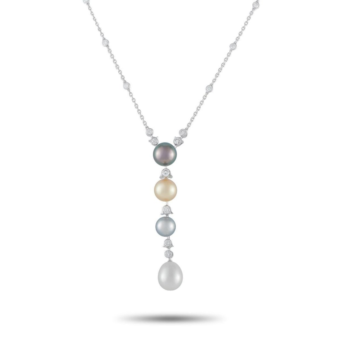 CARTIER 18K WHITE GOLD 1.80CT DIAMOND AND HIMALAYAN PEARL NECKLACE: A series of Himalayan Pearls in differing colors make this Cartier necklace incredibly elegant. Diamond accents with a total weight of 1.80 carats add subtle sparkle to the overall design. Crafted fro