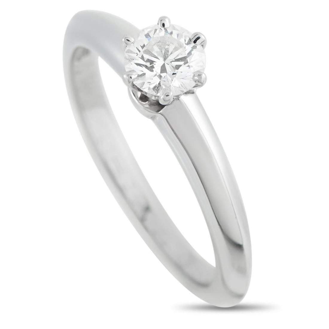 TIFFANY & CO. PLATINUM 0.40CT DIAMOND SOLITAIRE RING: This Tiffany & Co. solitaire ring is a timeless piece that will never go out of style. At the center, a 0.40 carat round-cut Diamond is beautifully showcased within a classic 6-prong setting. Crafted 
