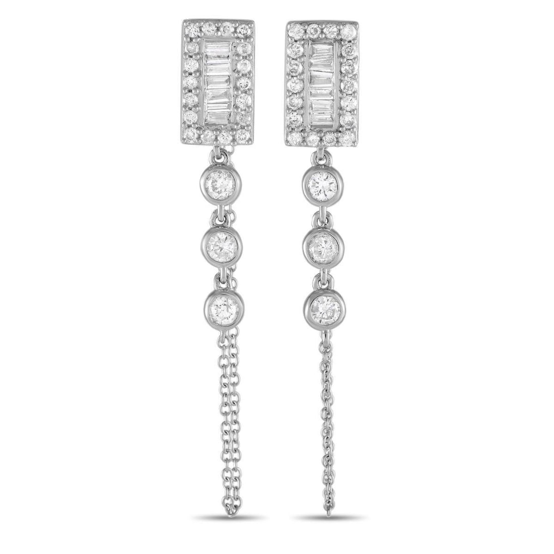 14K WHITE GOLD 0.60CT DIAMOND DANGLE EARRINGS: An array of sparkling diamonds with a total weight of 0.60 carats make these elegant earrings simply unforgettable. The 14K white gold setting measures 1.5 long by 0.20 wide and is elevated by a delic
