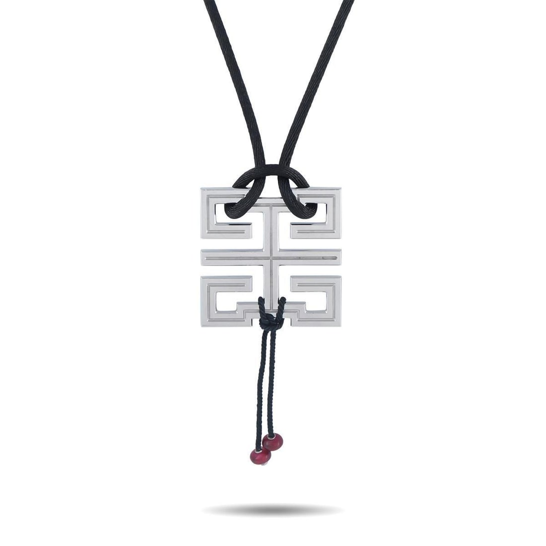 CARTIER LE BAISER DU DRAGON 18K WHITE GOLD NECKLACE: A Chinese inspired design makes a statement on this exquisite Cartier Le Baiser Du Dragon necklace. The 18K White Gold pendant measures 2.50 long by 1.25 wide and is suspended from a 20 black cord, wh