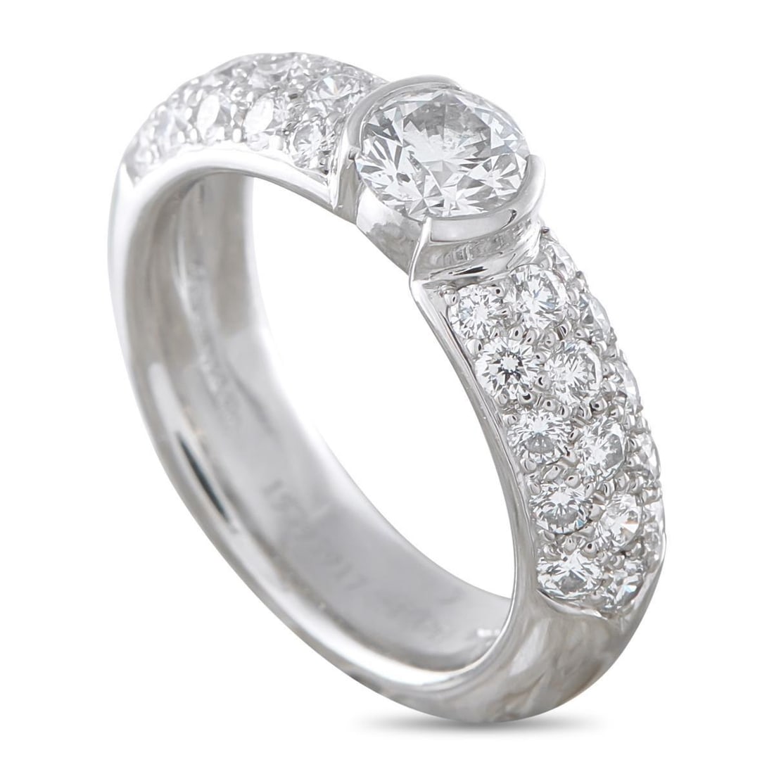 TIFFANY & CO. PLATINUM 0.96CT DIAMOND RING: This Tiffany & Co. ring is a piece that will continually impress. Set in Platinum, it features a 0.46 carat Diamond center stone and additional inset Diamonds totaling 0.50 carats. A 4mm wide band and