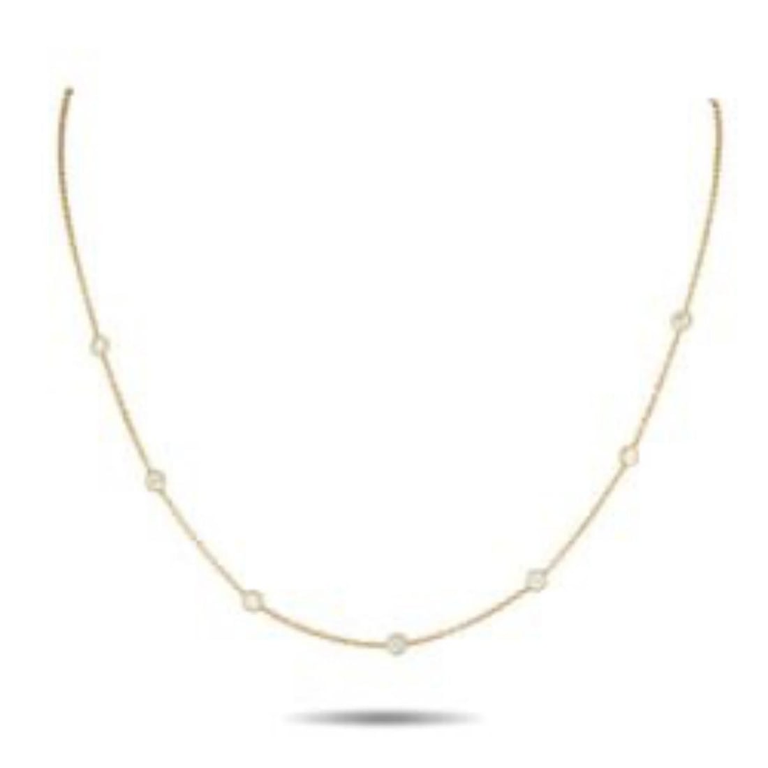 18K YELLOW GOLD 1.05CT DIAMOND STATION NECKLACE: A series of round-cut Diamonds with a total weight of 1.05 carats make this necklace sparkle every time it catches the light. The perfect piece for any occasion, its crafted from opulent 18K Yellow Go
