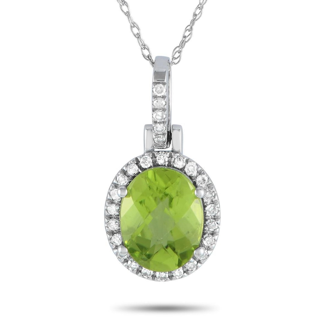 14K WHITE GOLD 0.13CT DIAMOND AND PERIDOT OVAL PENDANT NECKLACE: A splash of color and a shimmering sparkle are what you can expect from this piece. The necklace is crafted in 14K white gold and measures 18 long. The pendant measures 0.75 by 0.45 and is decorated w