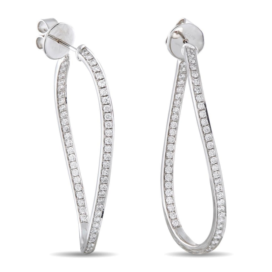 MEMOIRE 18K WHITE GOLD 1.50CT DIAMOND TWIST INSIDE-OUT HOOP EARRINGS: These Memoire twist hoop earrings are chic and incredibly contemporary. Curved lines elevate the classic 18K White Gold settings, which come to life thanks to sparkling Diamonds totaling 1.50 carats. 