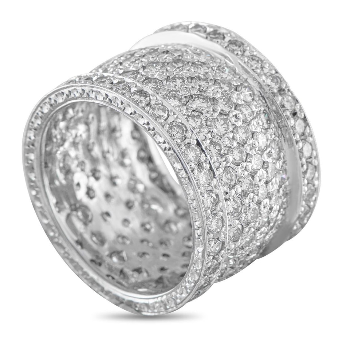 18K WHITE GOLD 5.50CT DIAMOND RING: Diamonds with a total weight of 5.50 carats make this ring a dazzling addition to any jewelry collection. Bold and incredibly impressive, the simple 18K White Gold setting measures 16mm wide and featu