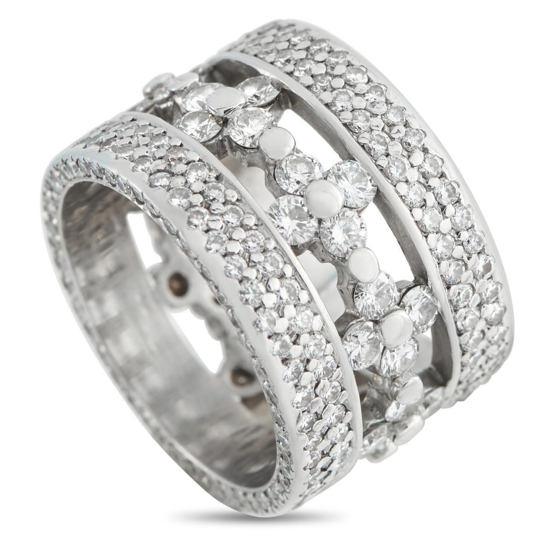 18K WHITE GOLD 4.33CT DIAMOND ETERNITY BAND RING: Negative space at the center of the design makes this eternity band ring incredibly opulent. Crafted from 18K White Gold, the detailed setting is elevated by a dazzling array of Diamonds totaling 4.33
