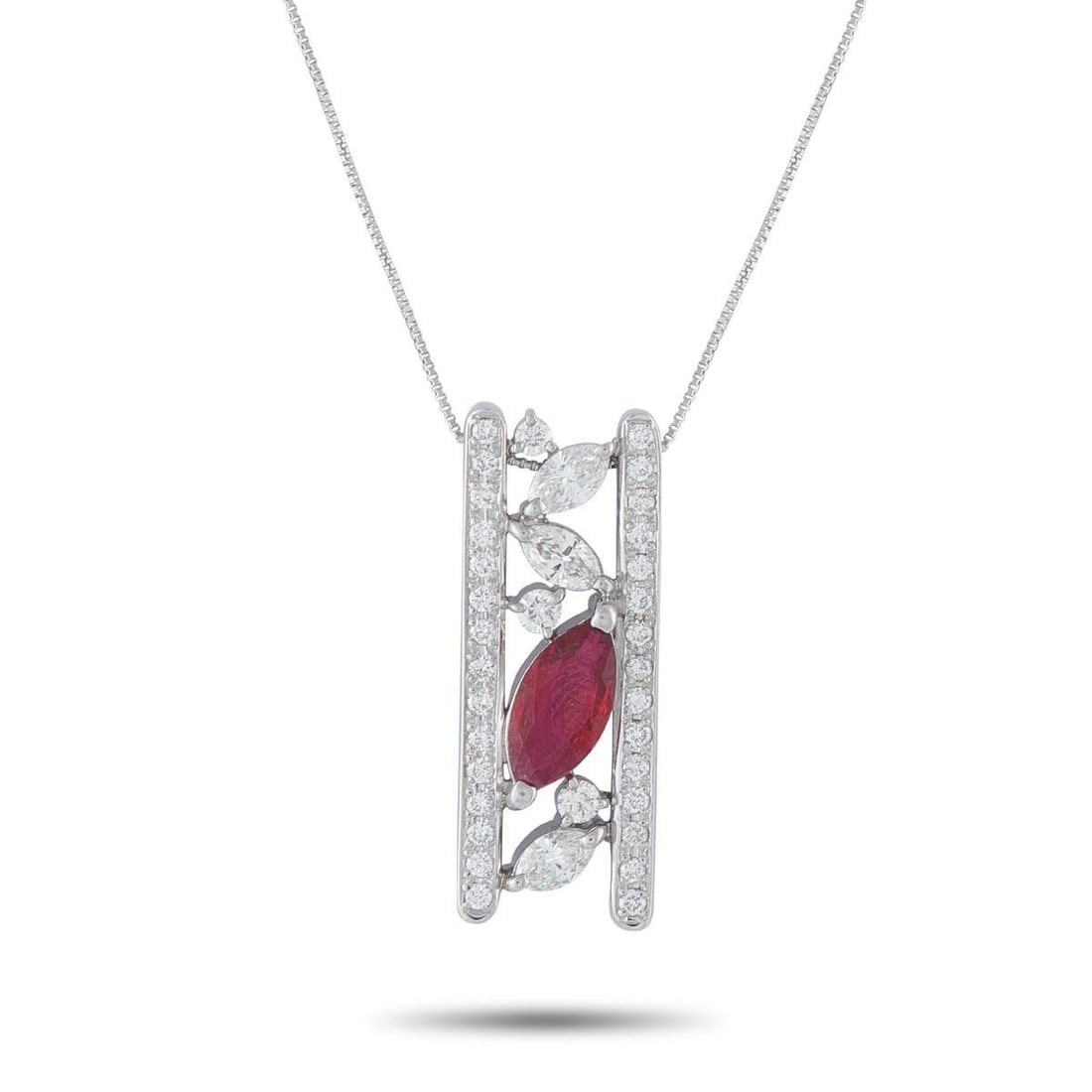 PLATINUM 1.12CT DIAMOND AND RUBY NECKLACE: This luxury necklace will elevate any ensemble. Set in Platinum, the dramatic pendant features a unique, openwork design that comes to life thanks to sparkling Diamonds totaling 1.12 carats. A single 