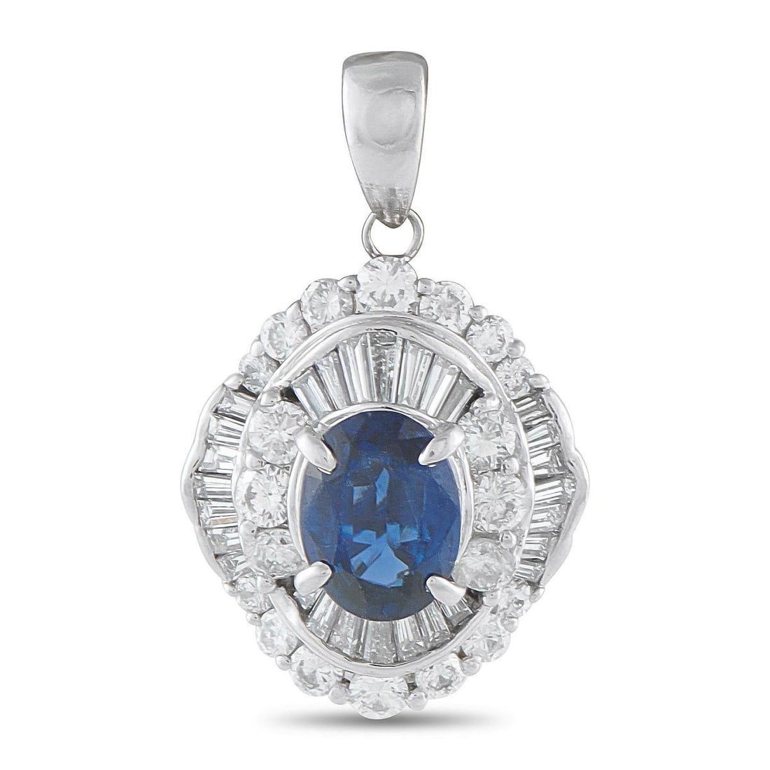 PLATINUM DIAMOND AND SAPPHIRE BALLERINA PENDANT: An pendant that catches attention with its distinctly graceful presence. It holds an oval blue sapphire held on four elegant prongs, and framed by two layers of diamonds that create a brilliant settin