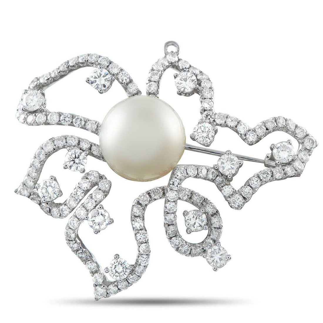 18K WHITE GOLD 5.0 CT DIAMOND AND PEARL BROOCH: The perfect accessory for dark evening wear, this brooch transforms the deep tones of a lapel or gown into a dramatic backdrop. The brooch is defined by sweeping and curving ribbons of white gold, tra