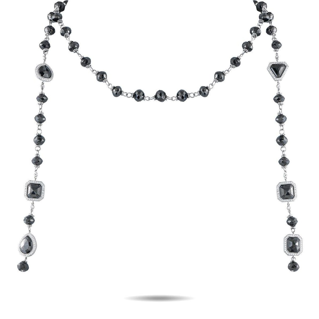 ERICA COURTNEY PLATINUM 120CT BLACK DIAMOND AND 2.0CT WHITE DIAMOND LARIAT NECKLACE: Dramatic in detail and rich in contrast, this lariat necklace by Erica Courtney showcases 120 carats of faceted black diamonds paired with 2.0 carats of brilliant white diamonds. Set in platinum, the 