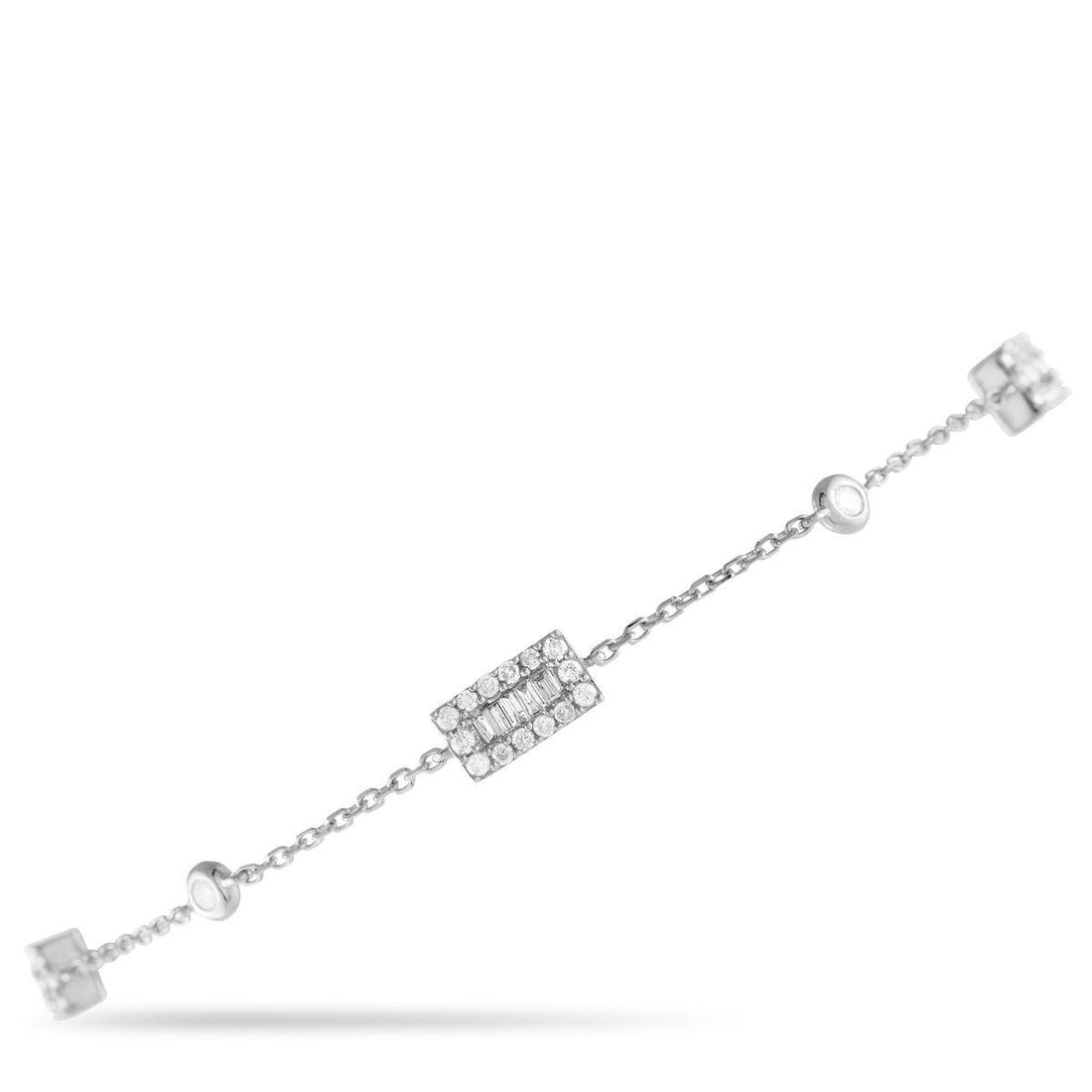 14K WHITE GOLD 0.45CT DIAMOND BRACELET: This bracelet is a simple stunner that looks good on its own or layered with other bracelets. It is crafted in 14K white gold and designed with an alternating pattern of bezel-set round diamonds and d