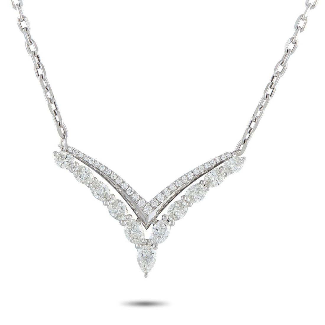 18K WHITE GOLD 2.20CT DIAMOND NECKLACE: Structure meets shine. In this necklace, a layered V of diamonds leads the eye to a luminous pear-cut apex. The upper V-line showcases round diamonds set along the white gold frame. Below, a second V 