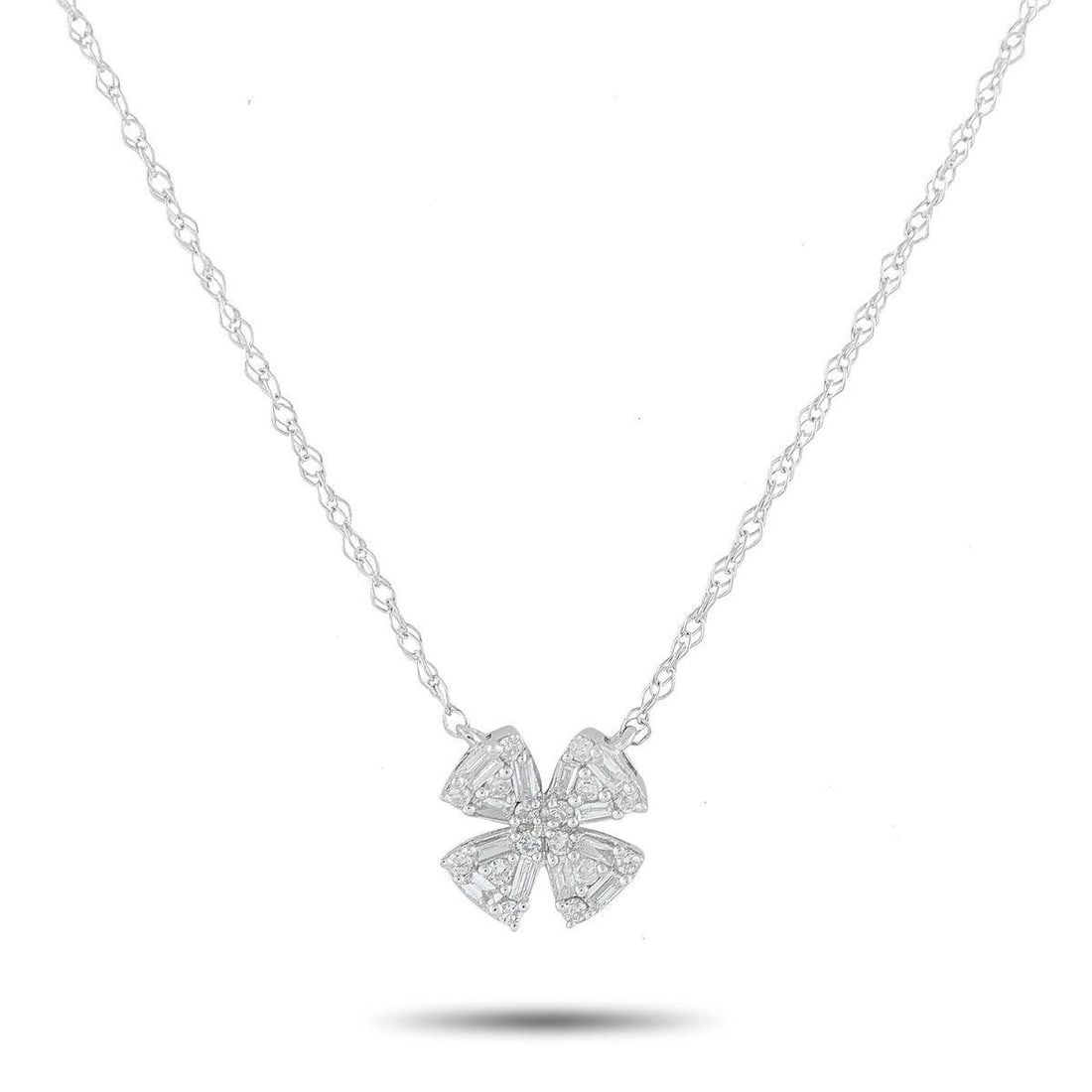 14K WHITE GOLD 0.20CT DIAMOND PENDANT NECKLACE: A clover-shaped pendant makes this 14K White Gold necklace a charming addition to any ensemble. Accented by Diamonds totaling 0.20 carats, the pendant measures 0.32 round and is suspended from an 18