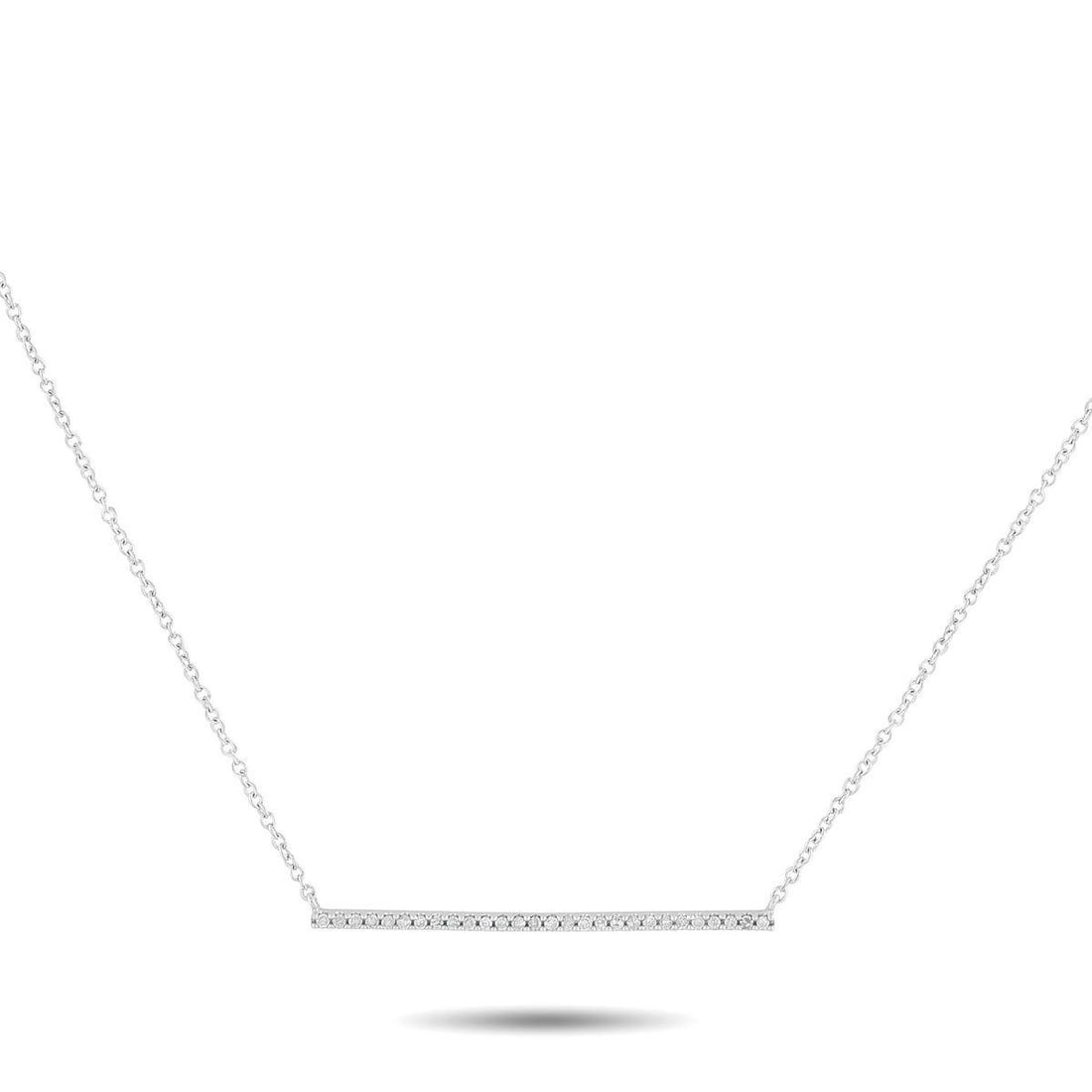 14K WHITE GOLD 0.10CT DIAMOND NECKLACE: This sleek, sophisticated necklace is the perfect way to add a touch of luxury to any outfit or occasion. The understated design features a series of Diamonds totaling 0.10 carats accenting a slender 