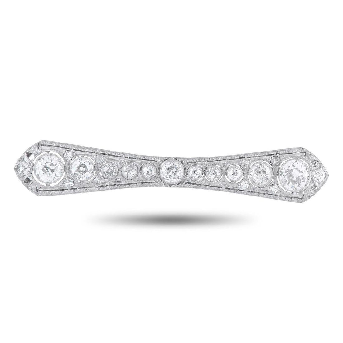 PLATINUM, 14K WHITE GOLD 3.50CT DIAMOND ART DECO BROOCH: This dazzling Art Deco brooch exudes glamour and old fashioned elegance. Round cut Diamonds with a total weight of 3.50 carats allow it to effortlessly catch the light no matter if its pinned to a sca