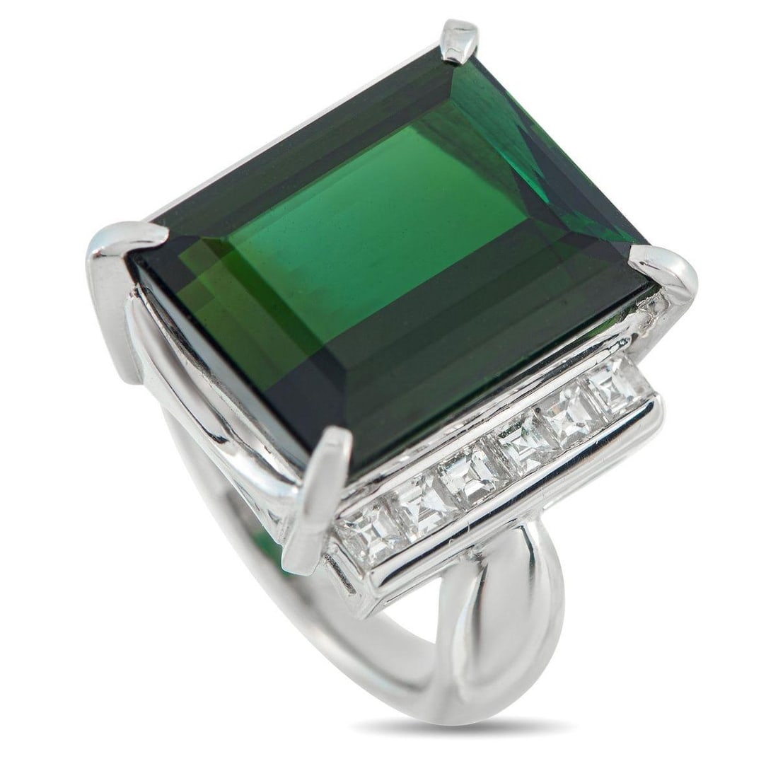 PLATINUM 0.99CT DIAMOND AND GREEN TOURMALINE RING: An piece displaying the perfect balance of softness and structure. It features a 15.07-carat green tourmaline sitting on four prongs above a box-style setting, giving it height and definition. On each