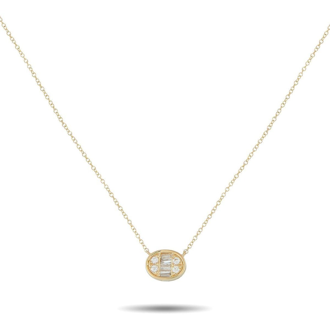 14K YELLOW GOLD 0.20CT DIAMOND NECKLACE: An easy choice. This diamond necklace features an oval bezel pendant set in a clean east-west layout. At the center, baguette diamonds lie horizontally, flanked by pairs of round diamonds for a soft