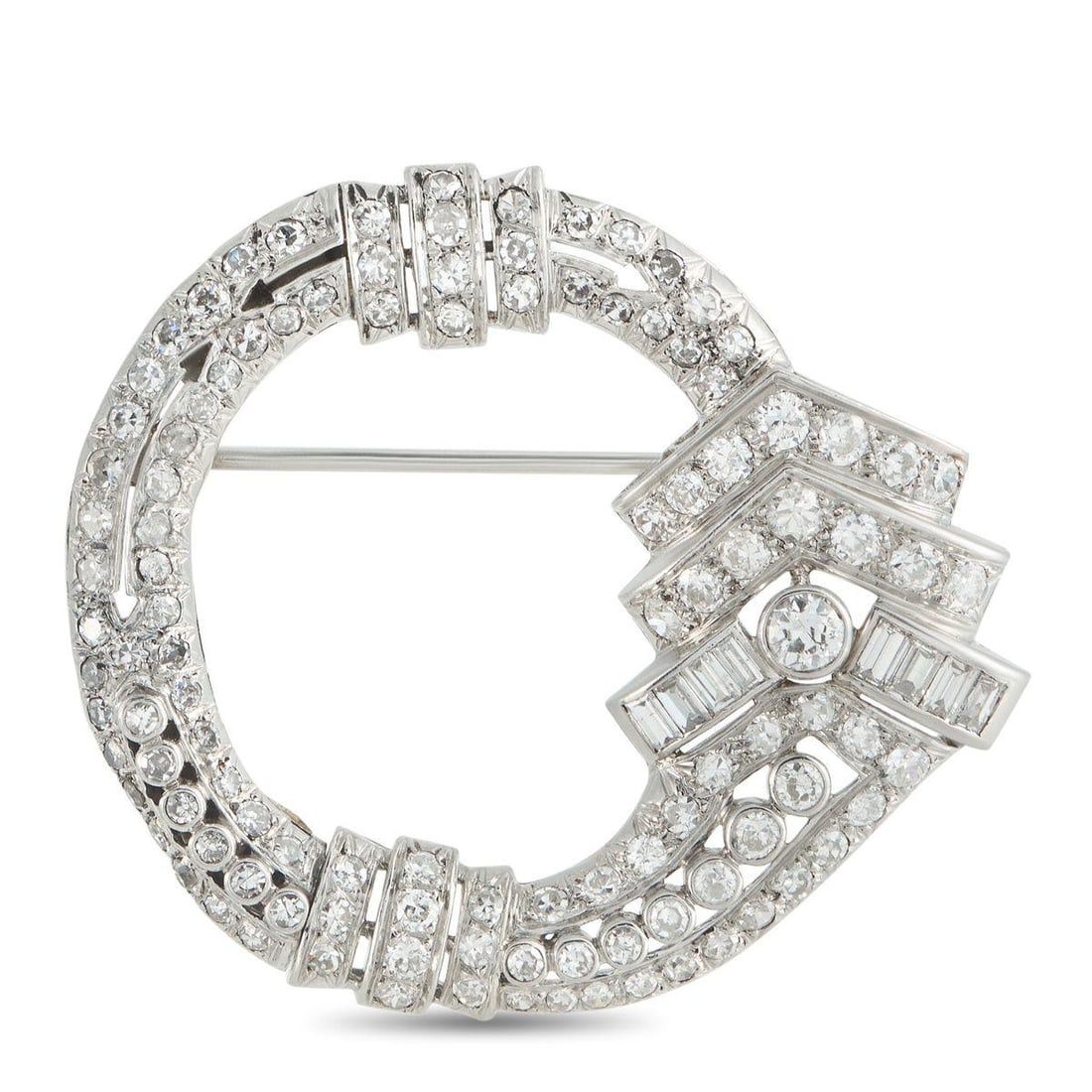 PLATINUM 6.50CT DIAMOND BROOCH: This luxury brooch is simply stunning. Crafted from Platinum, the circular design adds style and sophistication to any ensemble. Diamonds with a total weight of 6.50 carats make this an heirloom piece