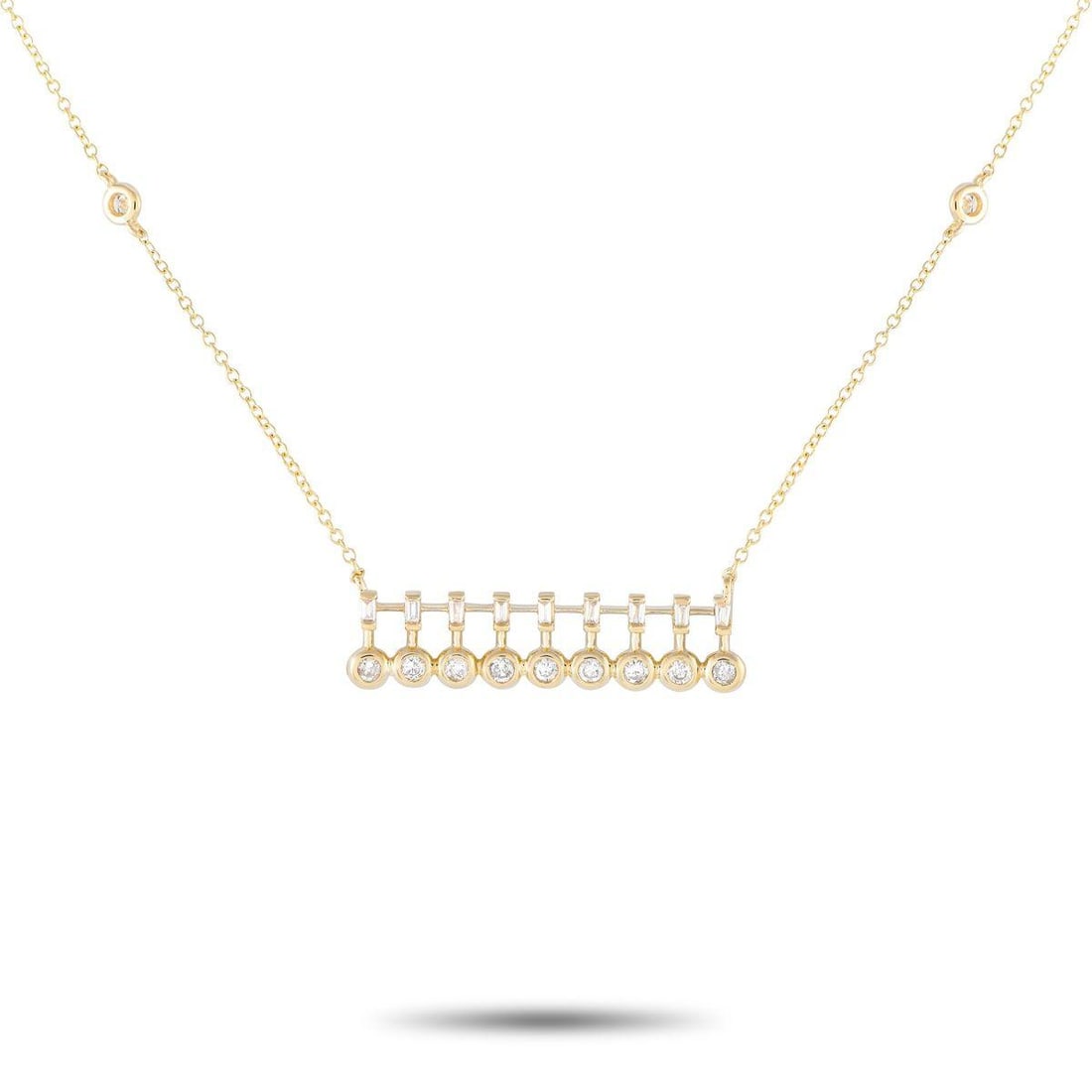 14K YELLOW GOLD 0.25CT DIAMOND BAR NECKLACE: A glittering jewel you can effortlessly take from office to dinner. This trendy piece features a 15 long chain with two bezel-set round diamond stations and a lobster clasp. It holds a horizontal pend