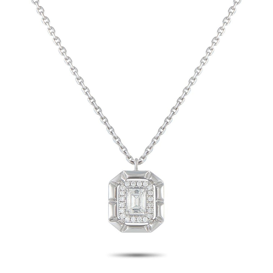18K WHITE GOLD 0.62CT DIAMOND PENDANT NECKLACE: A 0.50 carat Diamond makes a statement at the center of this exquisite necklace. Set in 18K White Gold, additional Diamond accents totaling 0.12 carats surround the center stone for additional sparkle